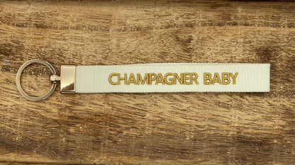 CHAMPAGNER BABY Schlüsselanhänger Keychain, gewebt - bestickt