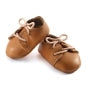 Djeco
POMEA Puppenschuhe braun