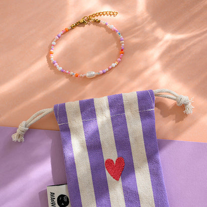 Ava&Yves Perlenarmband mit Karabinerverschluss und Säckchen